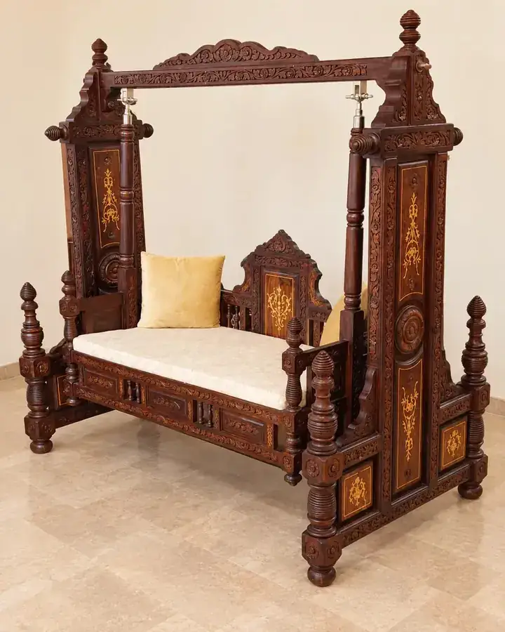 Hand carved wooden swing with inlay work