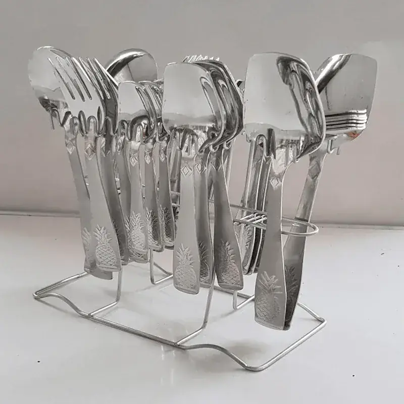 Engraved stainless steel cutlery set on a wire stand