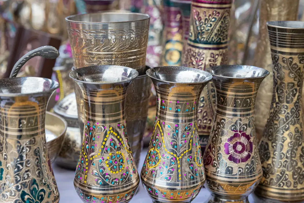 Hand engraved and painted brass vases