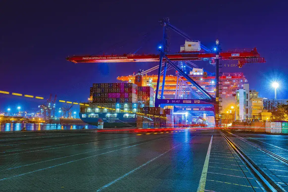 Container terminal lit up at night