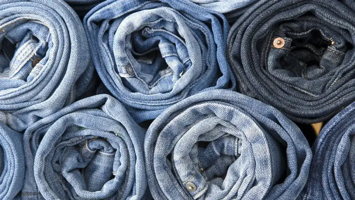Rolled denim jeans in light and dark washes